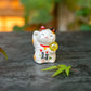 Cute Lucky Cat Holding A Glass Ball Figurine