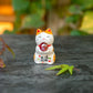 Cute Lucky Cat Holding A Glass Ball Figurine