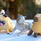 Cute Dog & Cat Under Strong Wind Figurine