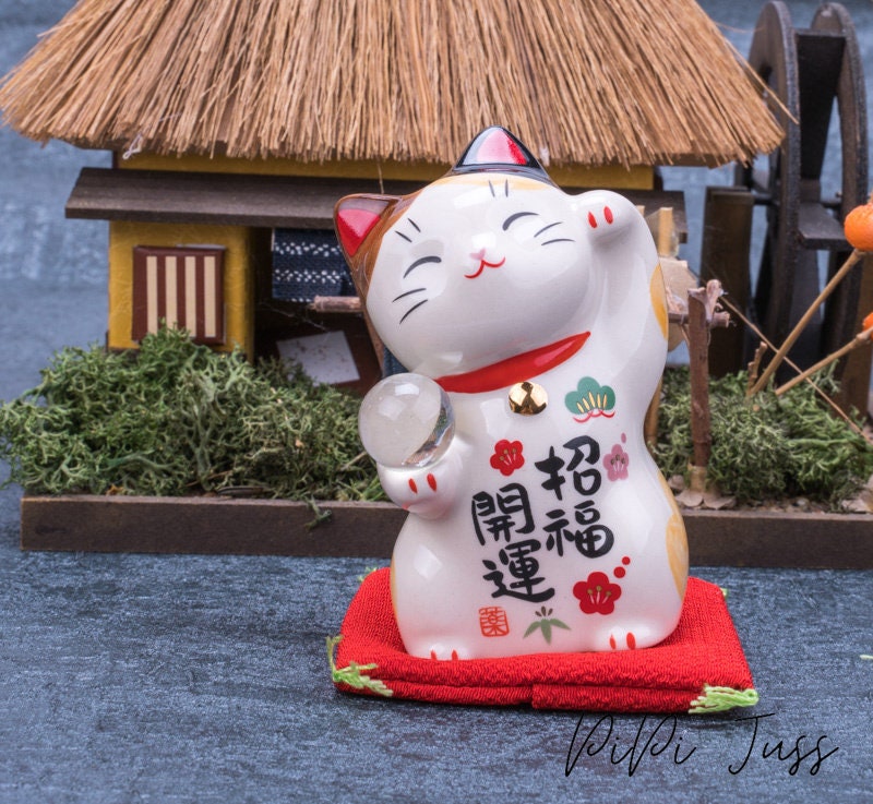 Cute Lucky Cat Holding A Glass Ball Figurine