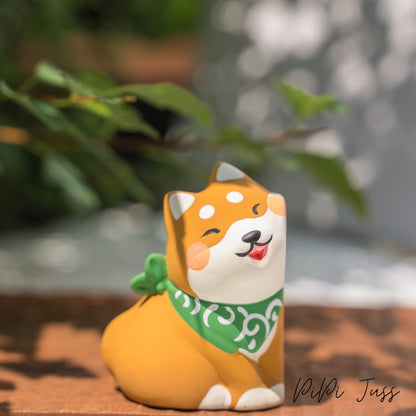 Cute Figurine Of Shibu Inu Pressing Cheeks Together